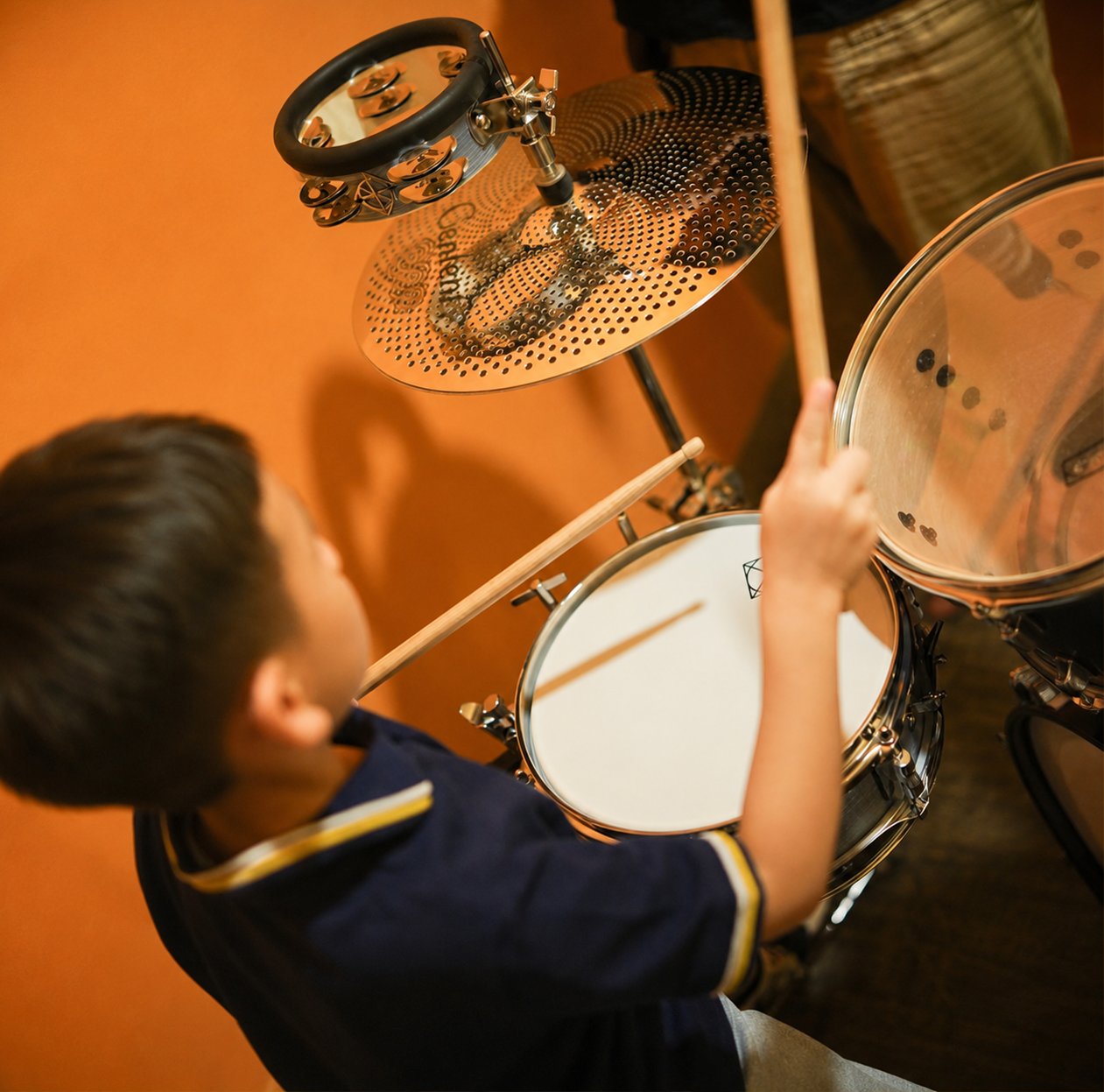 Drum student learning at Dandelion School of Music